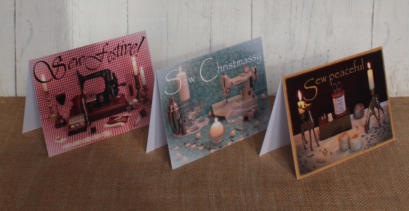 Pack of 12 Christmas cards with a vintage sewing theme.
