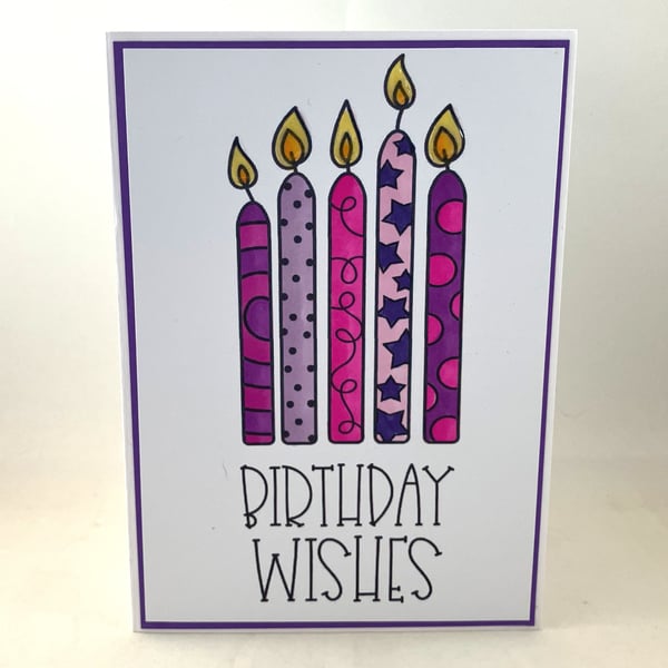 Pink and purple candles birthday card