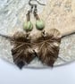 Sage green Czech glass and brass leaf pendant and earrings set, boho jewellery - Image 3