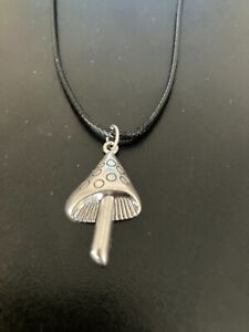 toadstool mushroom charm pendant on a 18" leather cord necklace