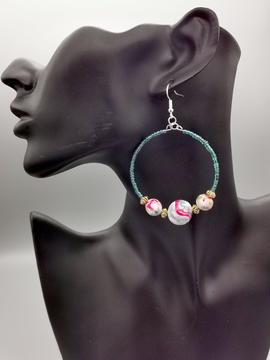 Colourful beaded hoop earrings