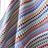 Crochet Blanket in multi coloured stripes