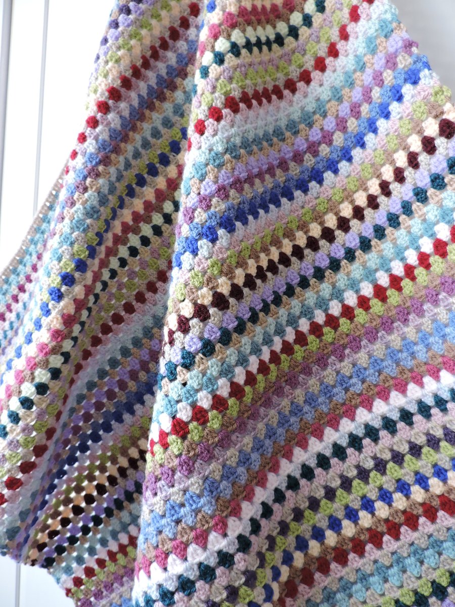 Crochet Blanket in multi coloured stripes