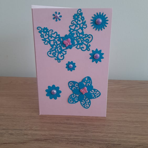 HANDMADE BUTTERFLY AND FLOWERS CARD.