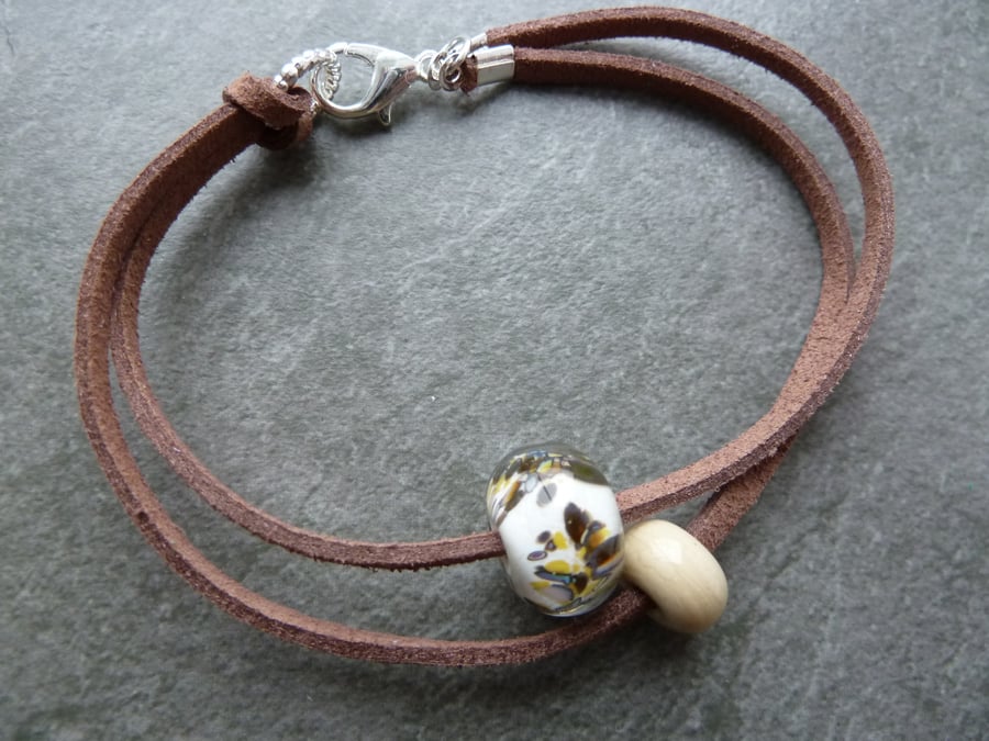 faux suede bracelet, ivory glass beads