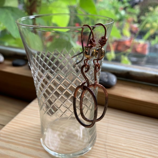 Copper oval dangly earrings