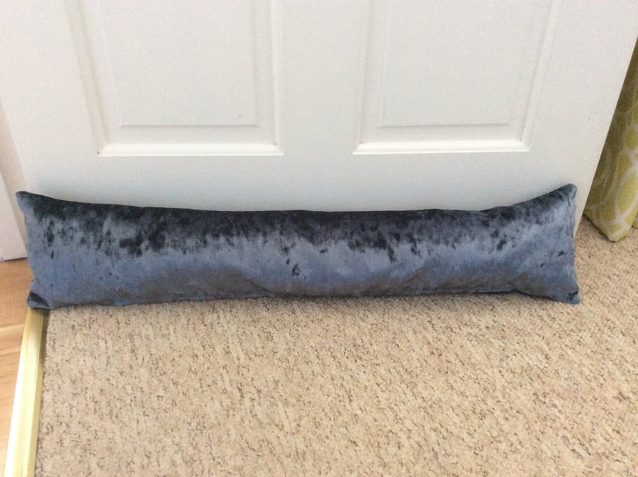 UNFILLED draught excluder in blue crushed velvet. 