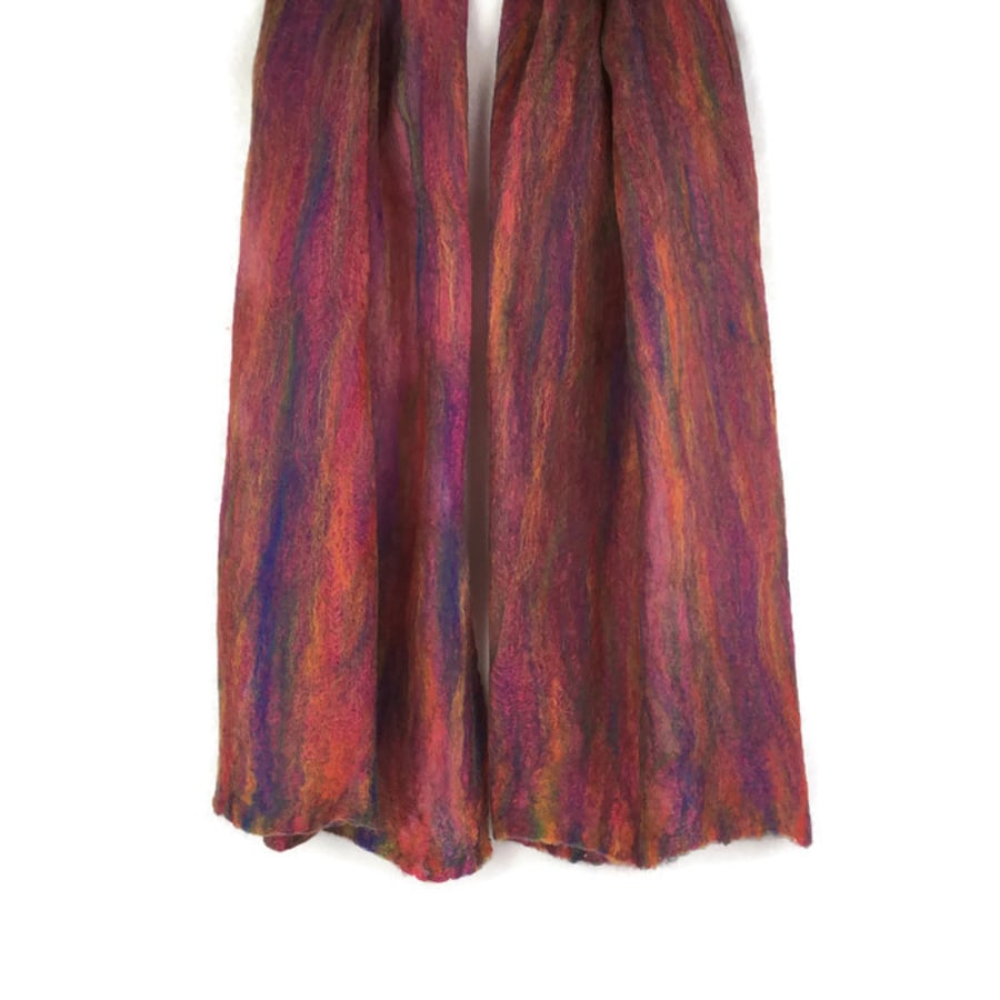 Lightweight nuno felted merino wool scarf in rainbow colours on pink