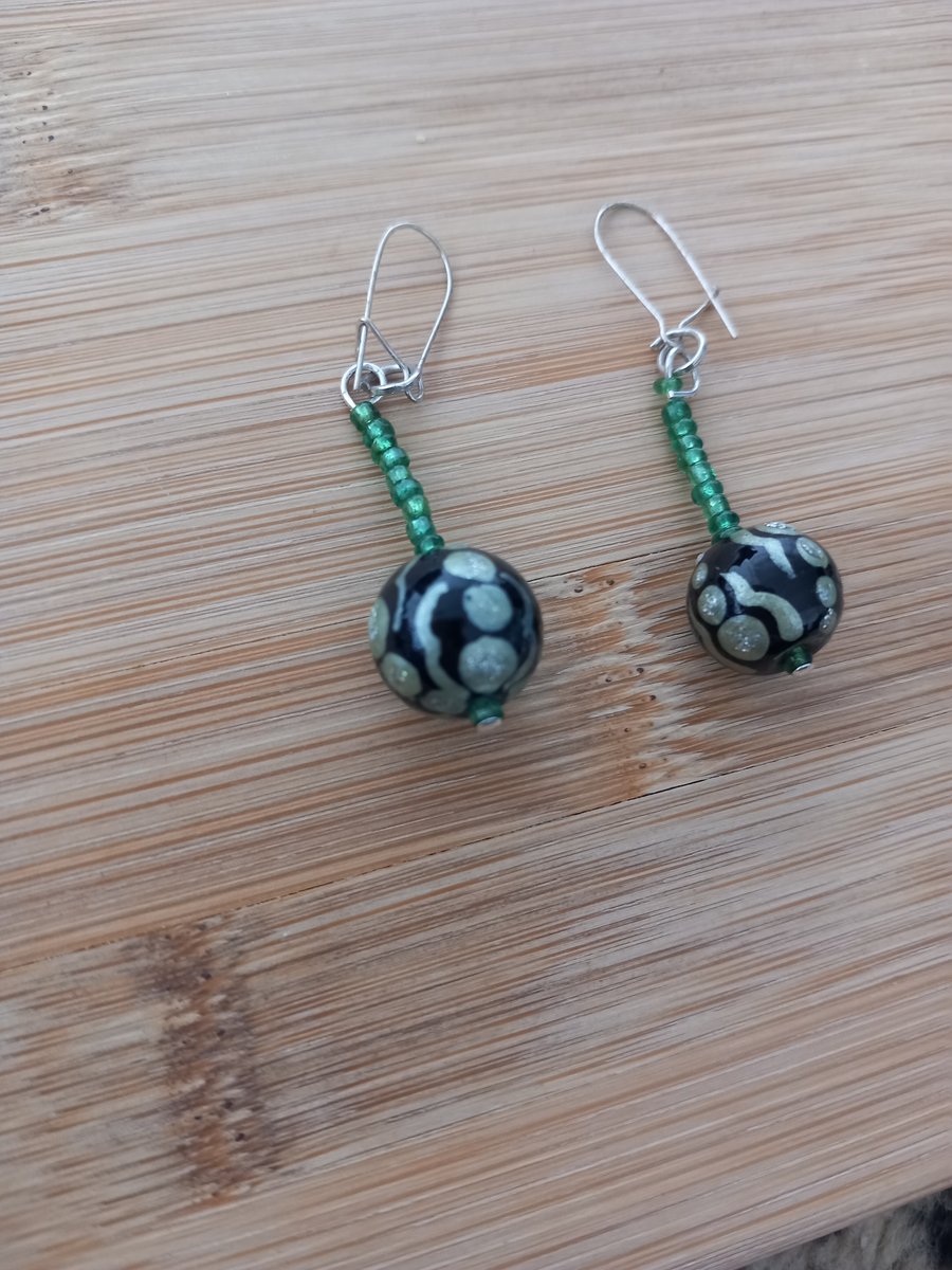 Green and black beaded earrings