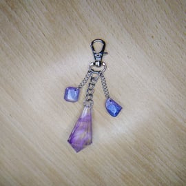 Purple swirl resin crystal bag charm