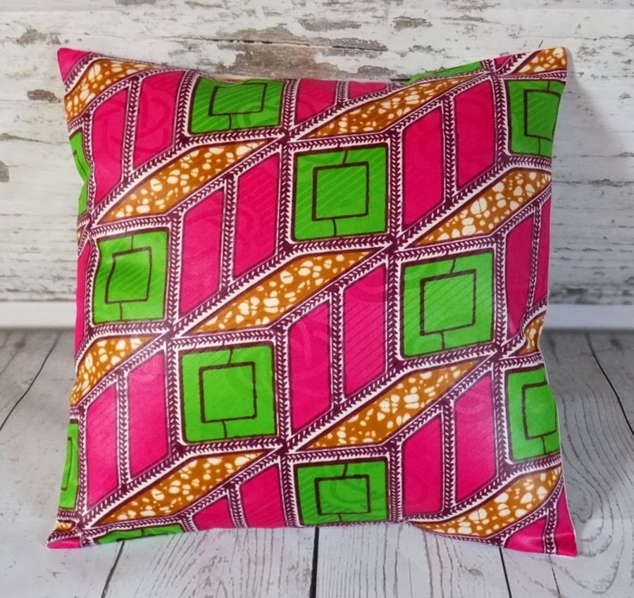 Cushion cover. African wax print, lime, magenta, burgundy and khaki