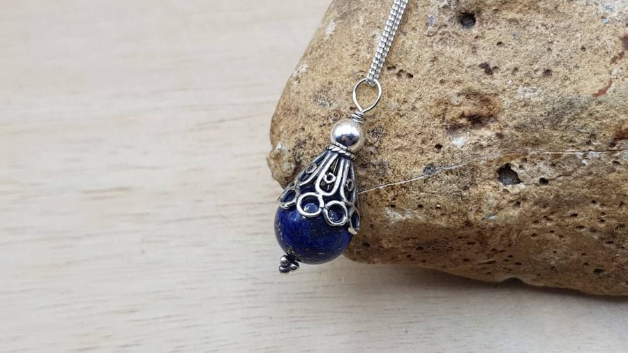 Lapis lazuli Pendant. Bali silver beads. September birthstone