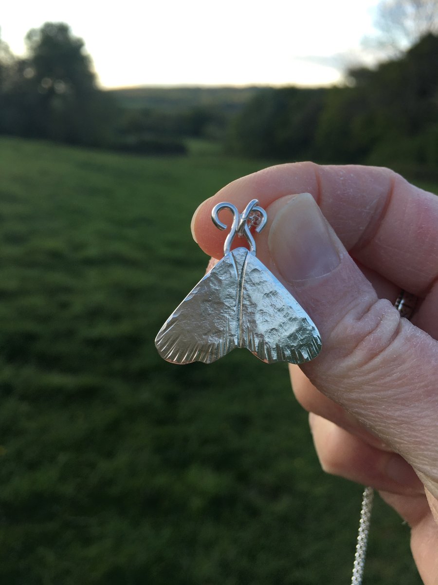 Midwinter moth, recycled silver pendant