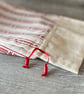 Scandi Style Red and White Drawstring Bottle Bag - Image 6