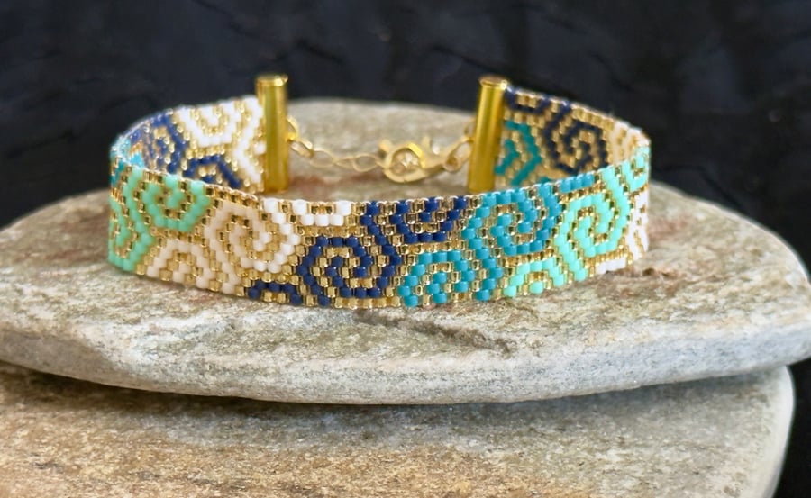 Handwoven Beadwork Swirl Pattern Bracelet in Turquoise, Navy, White & Gold