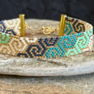 Handwoven Beadwork Swirl Pattern Bracelet in Turquoise, Navy, White & Gold