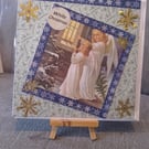 two angels looking in  at the church window