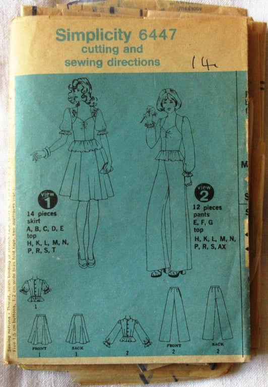 A vintage sewing pattern for a misses' skirt, trousers and peplum top in size 14