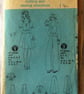 A vintage sewing pattern for a misses' skirt, trousers and peplum top in size 14