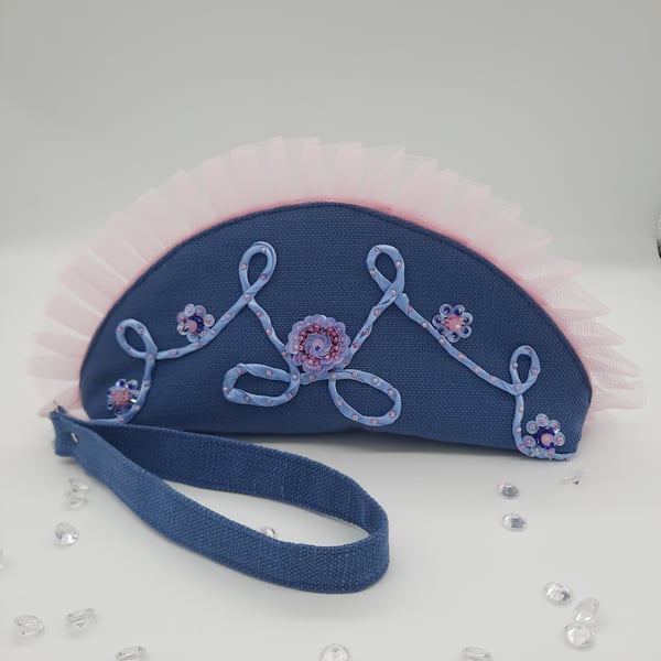 Blue and pink beaded clutch bag with wrist strap.  