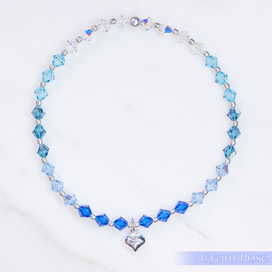 Swarovski and Sterling Silver puffed heart charm beaded bracelet