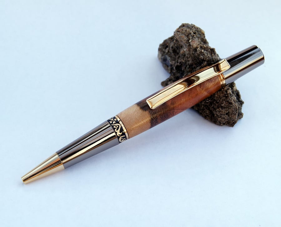 Zeta end twist pen dressed in Spalted Laurel