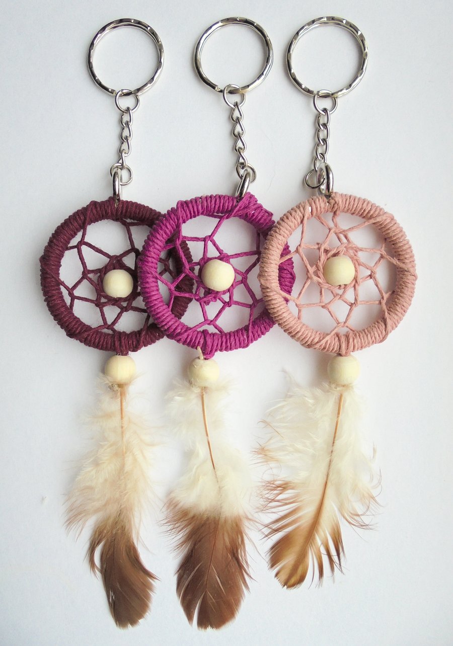 Mini pink dream catcher keyrings with a corded hanger option 