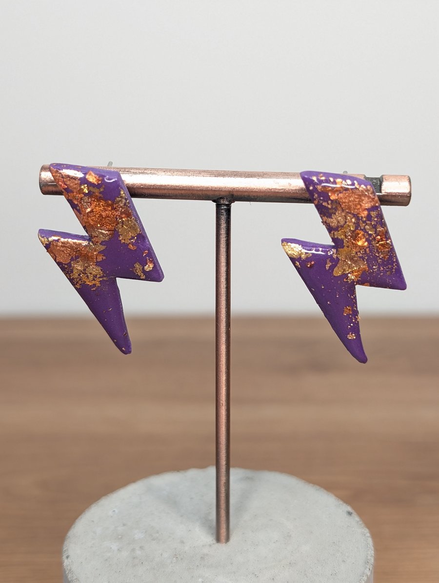 Purple gold lightening bolt earrings 