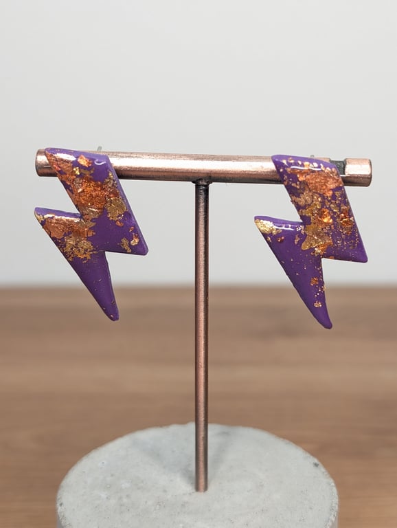Purple gold lightening bolt earrings 