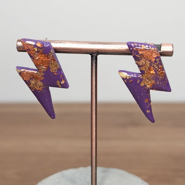 Purple gold lightening bolt earrings 