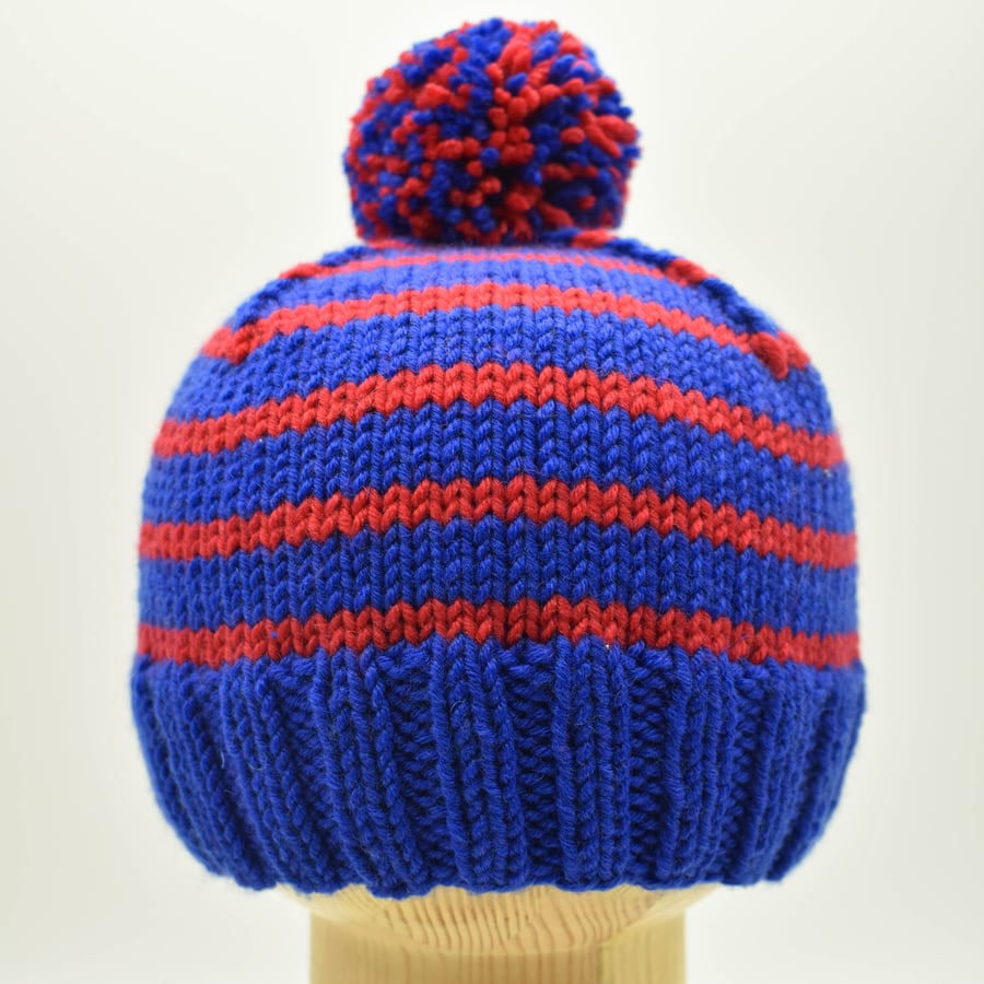 SOLD - Hand knitted baby hat in blue and red stripes