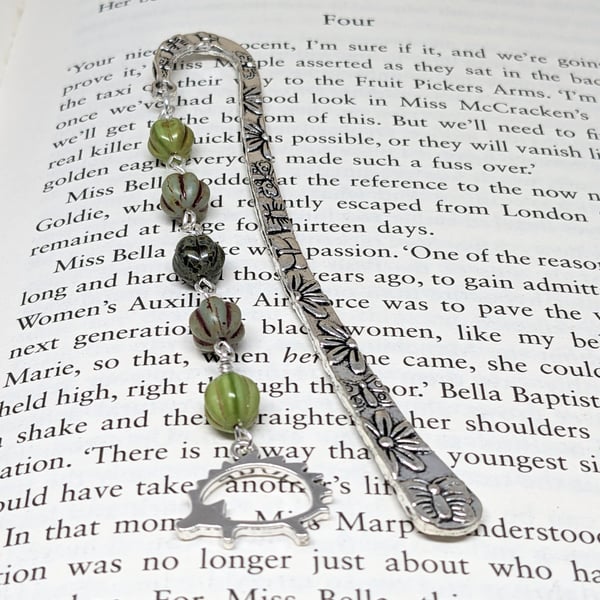 Bookmark with green glass beads and hedgehog charm