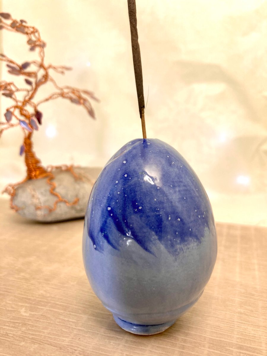 Blue ceramic egg incense stick holder