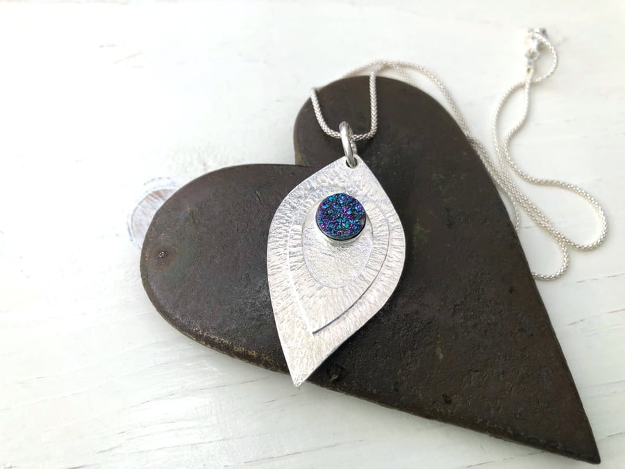 Silver Teardrop Shaped Pendant with Drusy Cabochon .