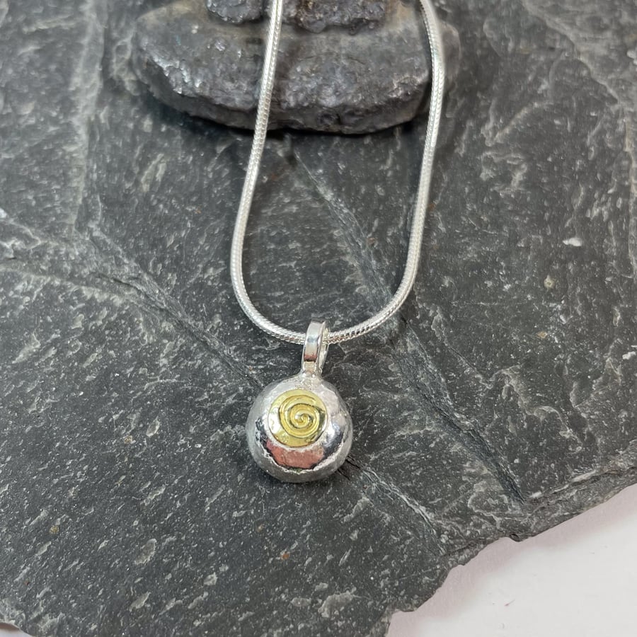 Silver and 18ct gold spiral pebble pendant and chain