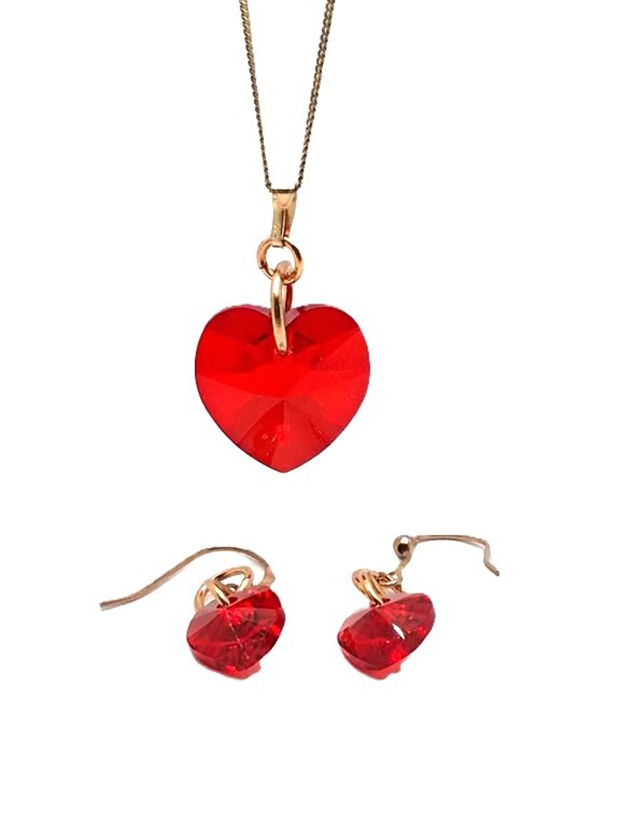 Necklace and earrings set with red heart shaped Swarovski crystals