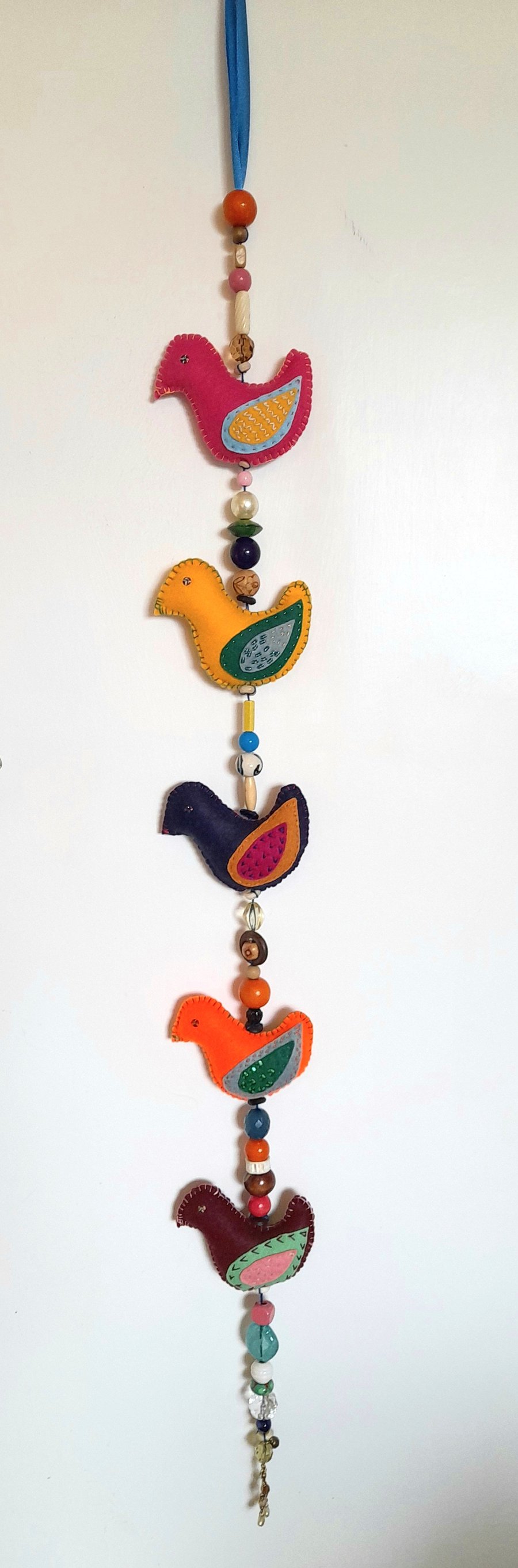 Sweet Tweets - A skein of decorated felt birds, joined with beads, ready to hang