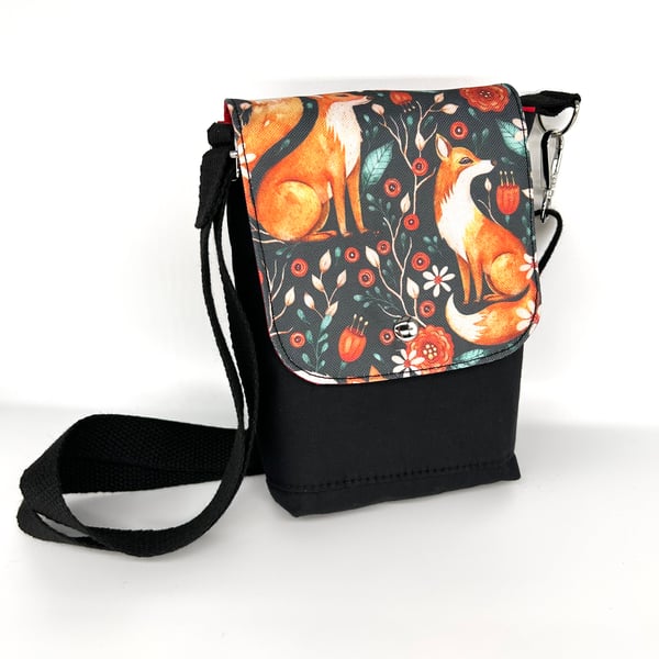 Fox print on a cross body bag with adjustable strap, fully lined with red fabric