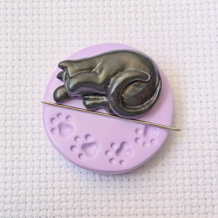 Black Cat Needle Minder with Purple Base. For cross stitching, embroidery