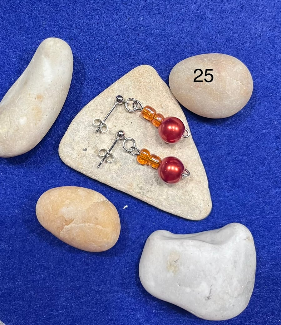 Beautiful orange dangling earrings.