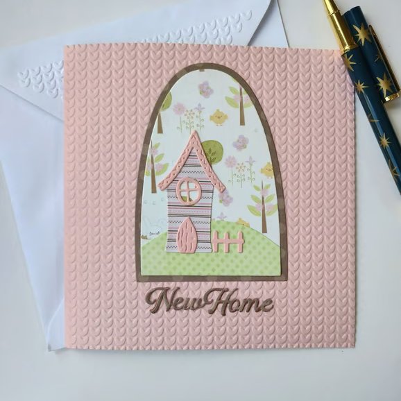 New Home Card - Pink House with woodland scene and knitted effect embossed card