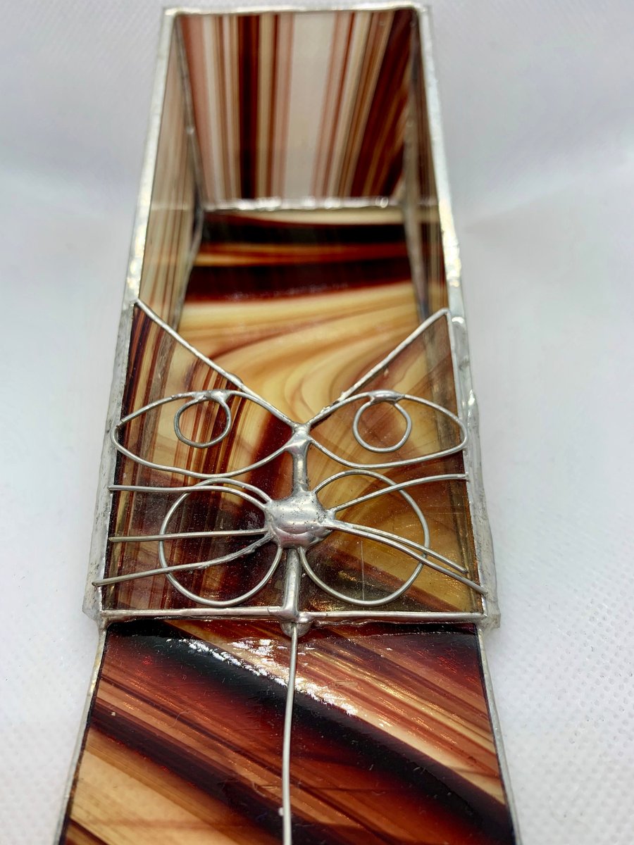 Stained glass stretching cat 