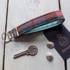 Harris Tweed key fob wrist strap in turquoise, burgundy, orange and green tartan