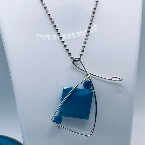 Bargain blue cushion reconstituted gemstone jazzy pendant