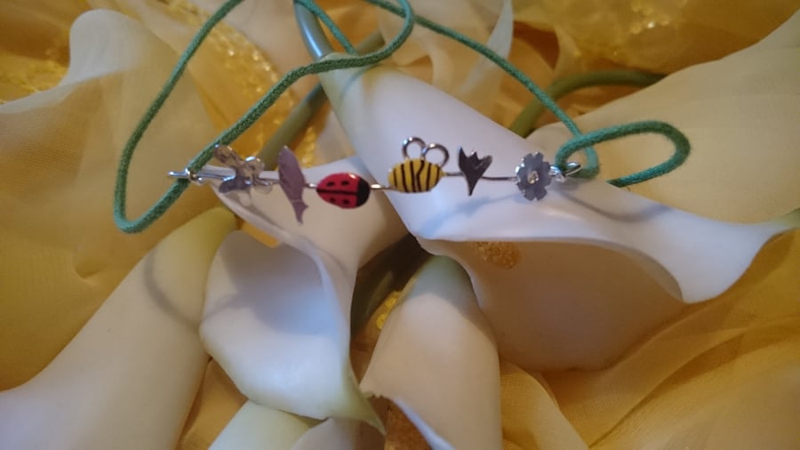 Sterling silver ladybird and bee bracelet 