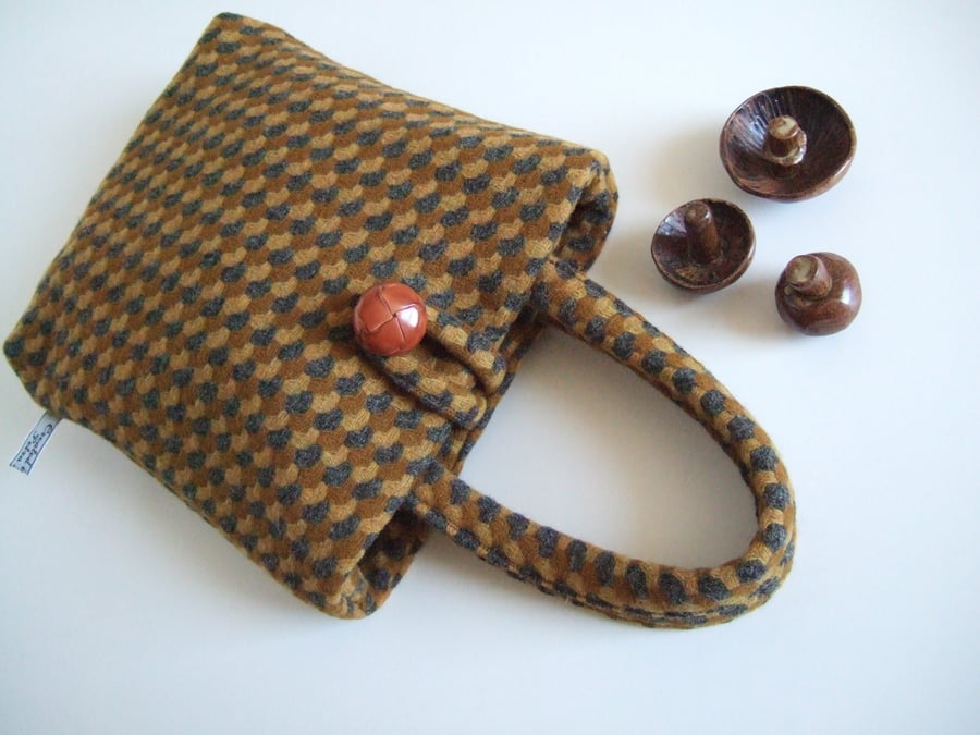 A little winter woollen bucket bag, in a brown and grey patterned wool.