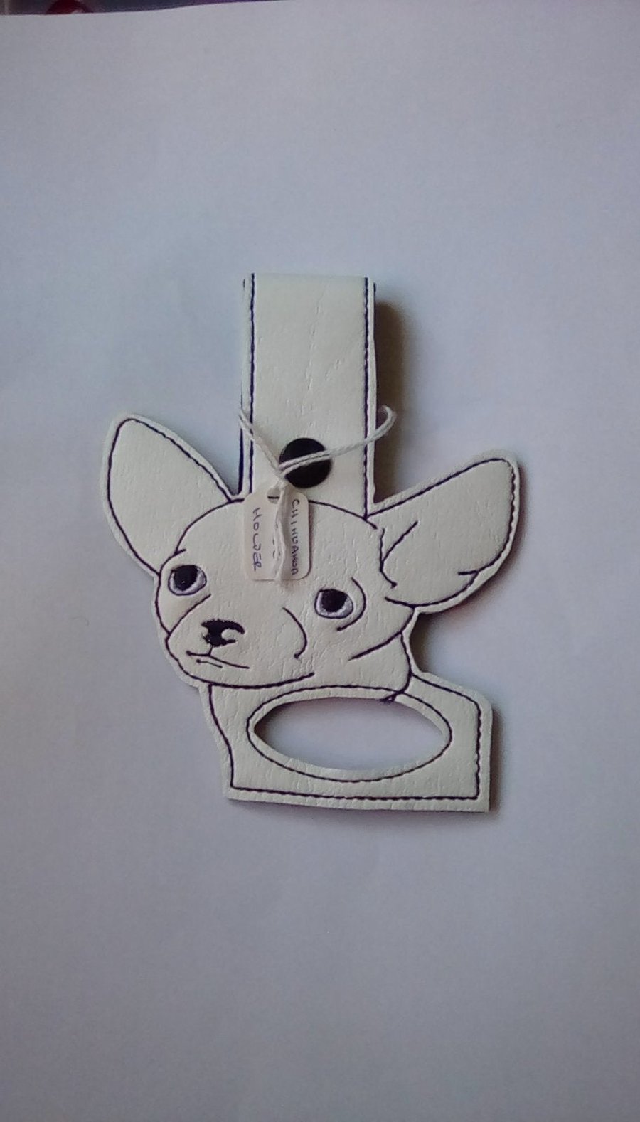 100. Chihuahua tea towel holder.