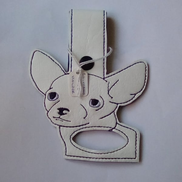 100. Chihuahua tea towel holder.