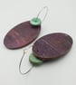 Oval shaped earrings in burgundy with a mint button bead - Image 3