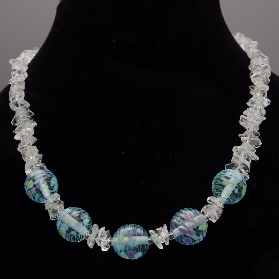 Frosty lampwork glass necklace with blue topaz chips